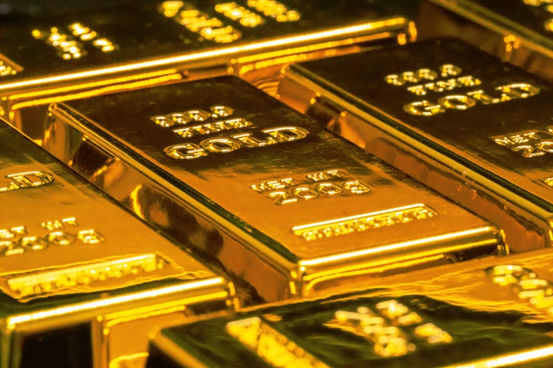 Stacked metal bullion bars.